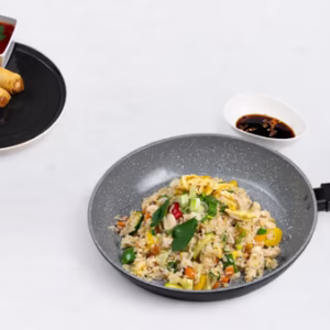 Baked rice and vegetable spring roll with chili sauce