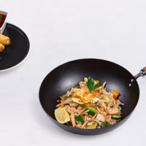 Udon noodles and vegetable spring roll with chili sauce